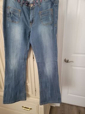 Light Wash Flared Jeans with Embellished Waist